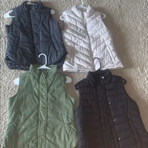 4 Never-worn winter vests